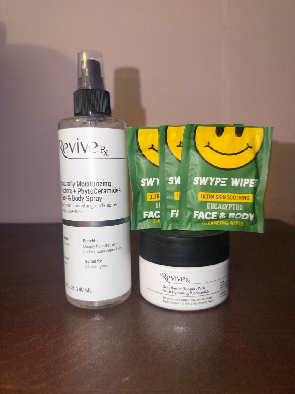 Hydrating Face & Body Spray in Clear + Skin Barrier Support Pads in White